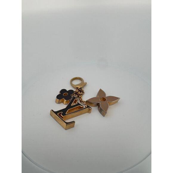 Louis Vuitton Fleur de Monogram Bag Charm โ Gold & Black - Picture 1 of 4